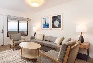 The living area in the Two Bedroom Partial Ocean View Suite at Gurney's Montauk Resort