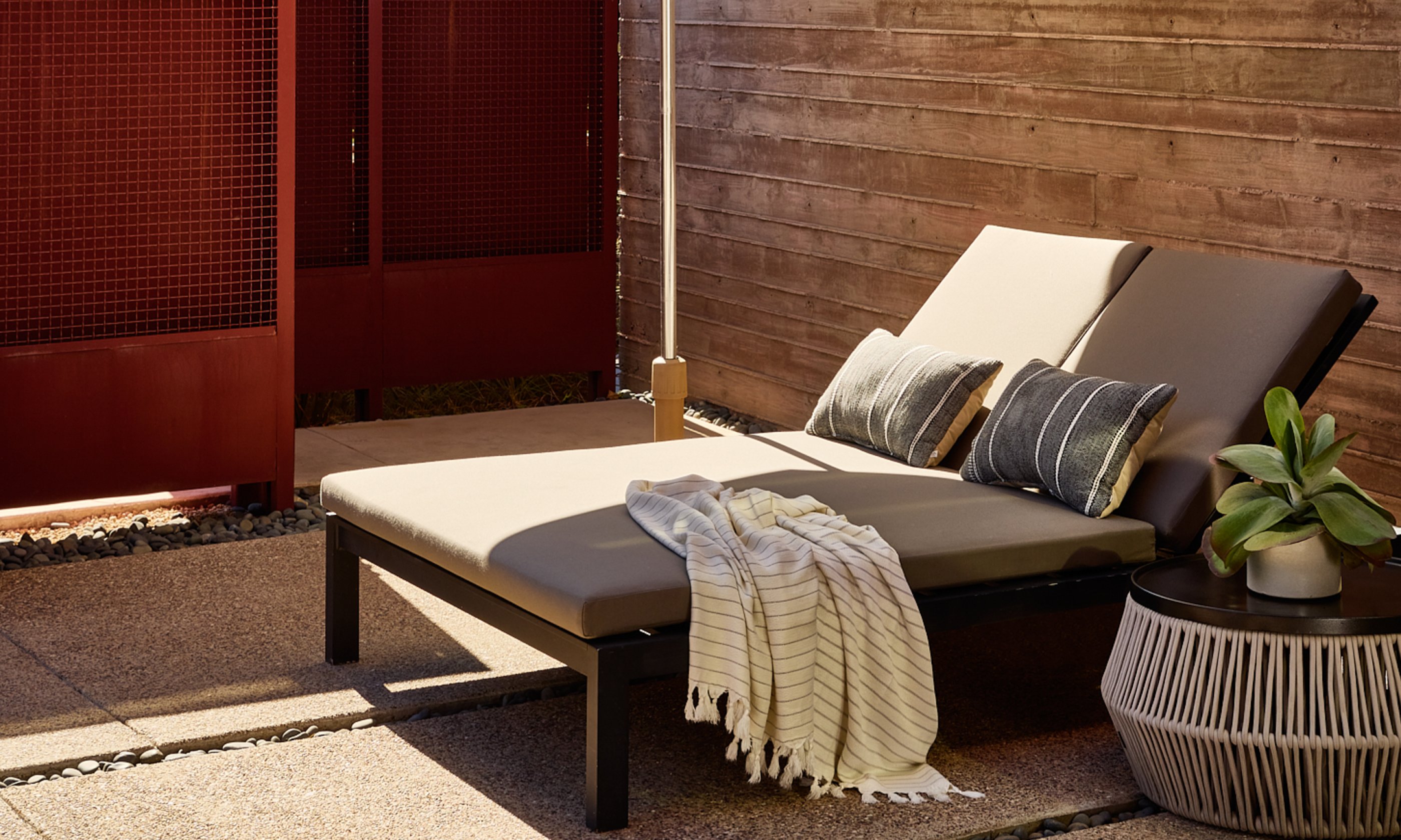 Couples lounge chair on terrace casita outdoor patio.