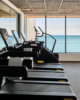 Fitness center with treadmills and stair climber.