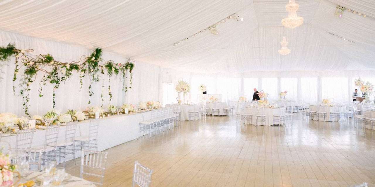 Banquet hall with tables and flowers