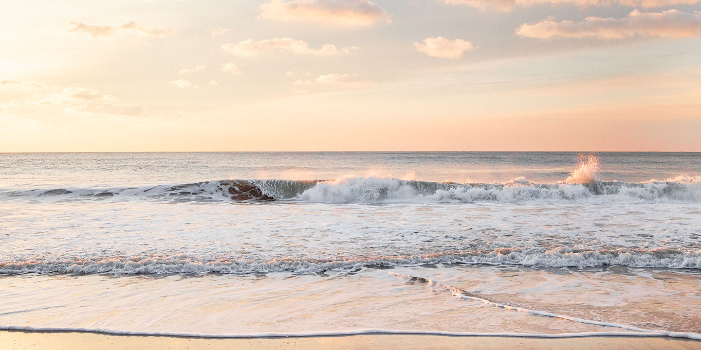 ocean waves at sunset