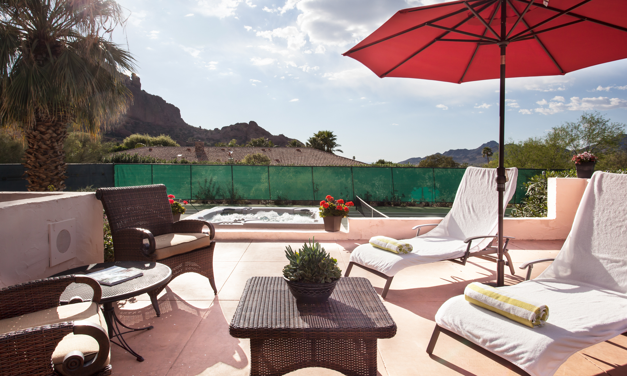 Villa Norte private patio with seating area, hot tub and view of Camelback Mountain.