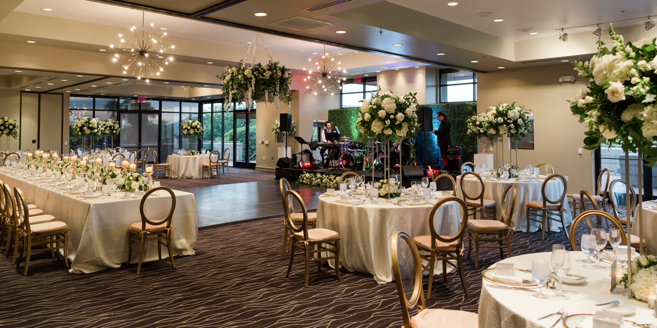 Views Ballroom set up for wedding reception with band stage and dance floor.