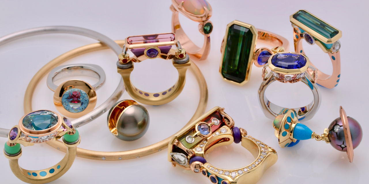 A colorful assortment of rings and jewelry from designer Raintree