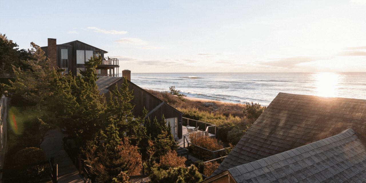 Sunrise over the ocean at Gurney's Montauk Resort; a woman in a yoga pose outdoors
