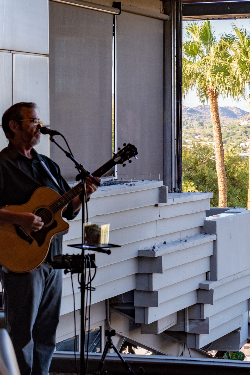 A musician sets up for live music at Jade Bar in Scottsdale