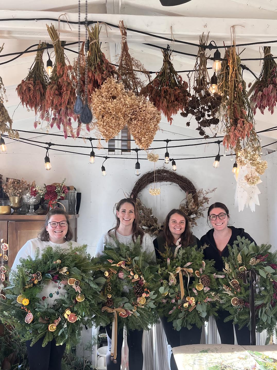 Girls holding Wreaths