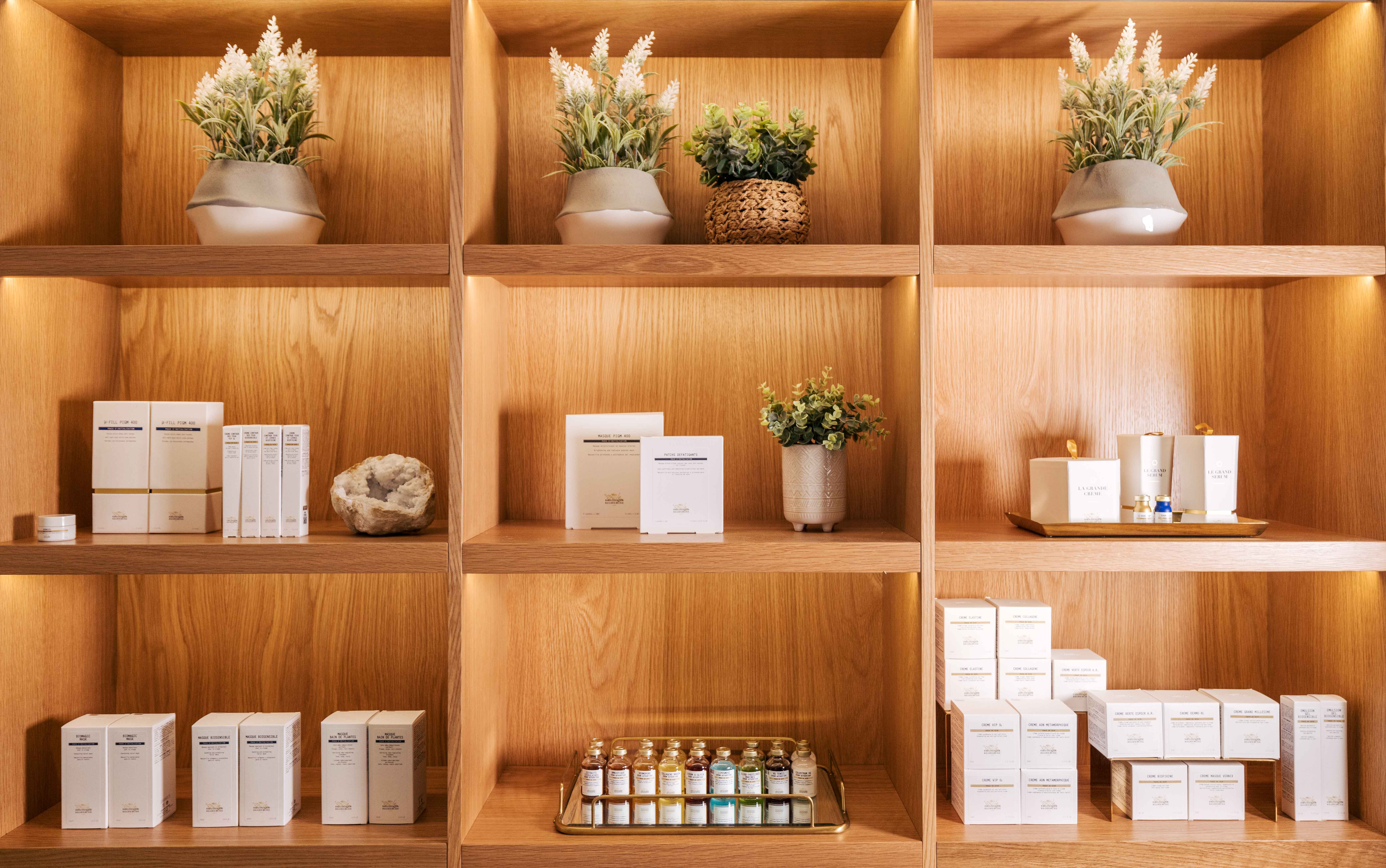 Biologique Recherche displayed on wooden shelves at Gurney's Seawater Spa.