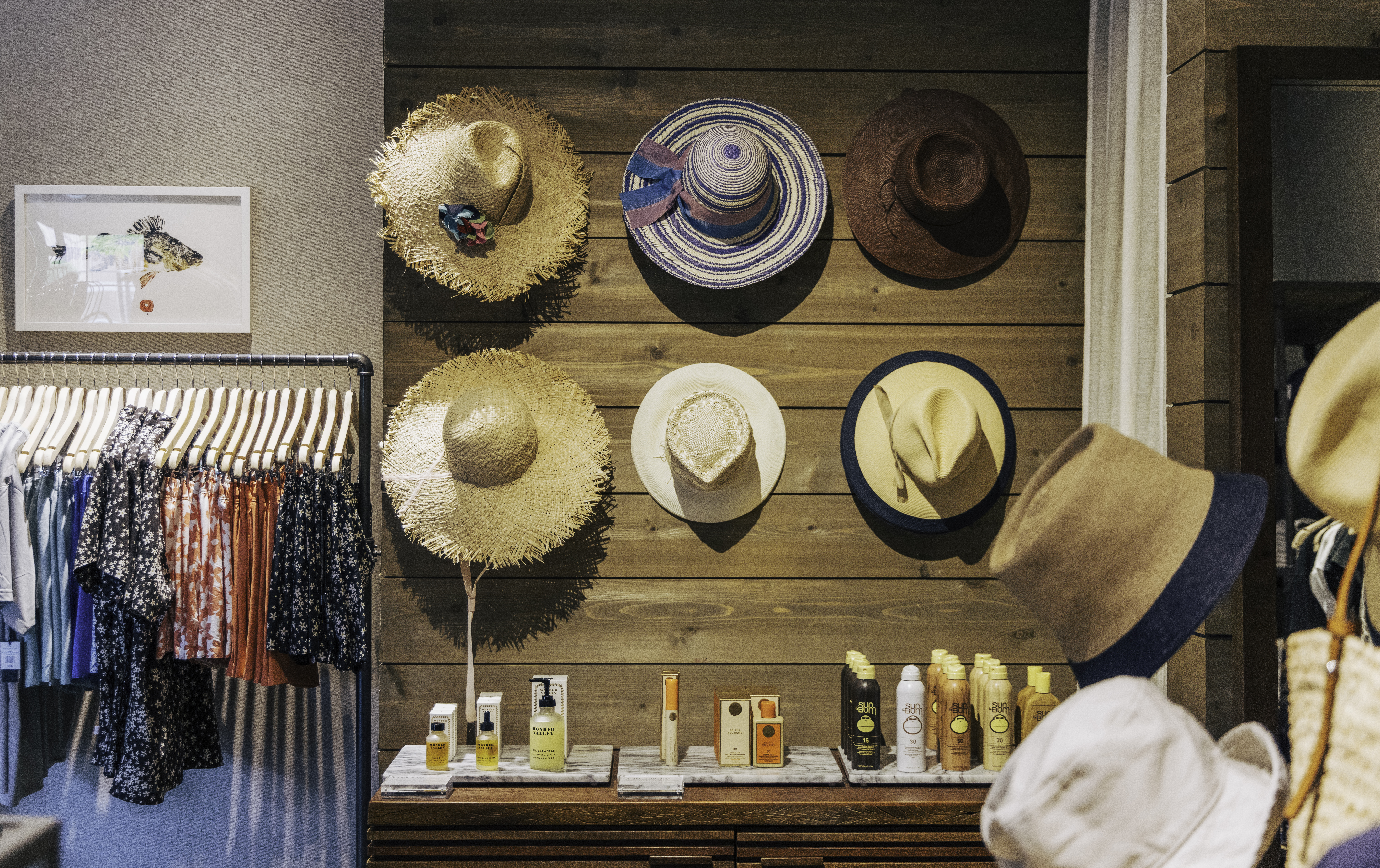 Gurney's shop with a display of hats and clothing.