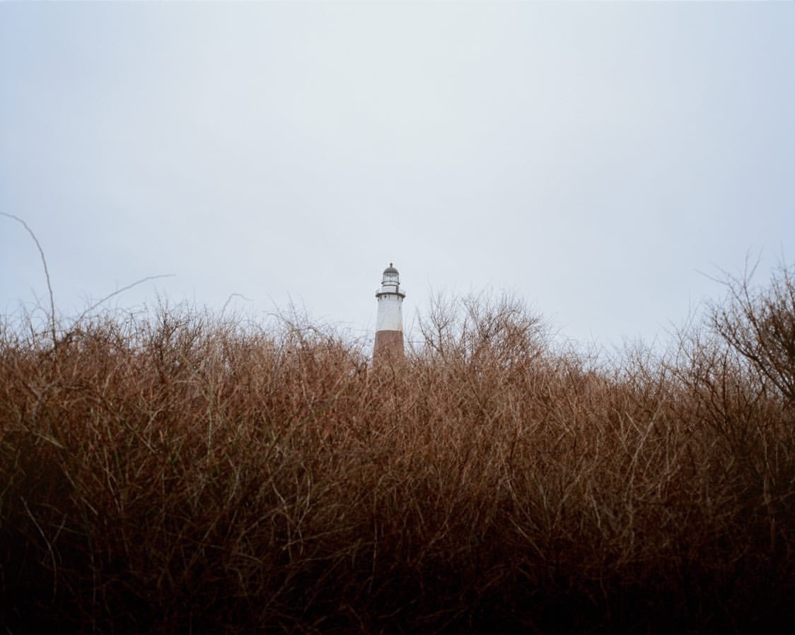 View of Montauk Lighthouse from across field.