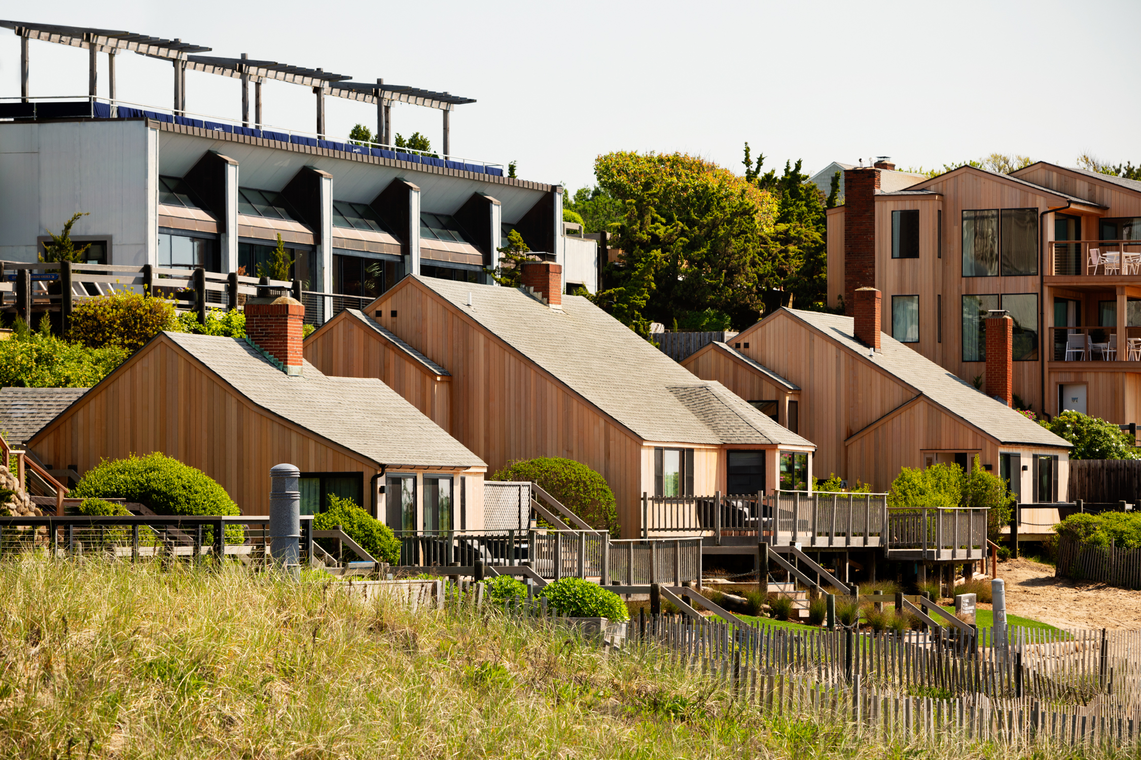 Exterior view of Cottages at Gurney's Montauk during daytime.