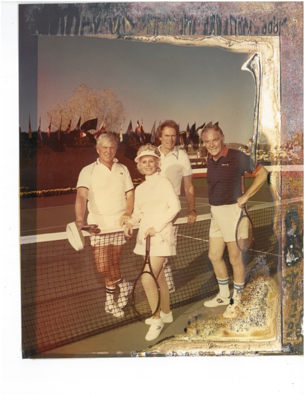 Historical photo of celebs including Clint Eastwood, Jaja Gabor and others on the tennis courts at Sanctuary.