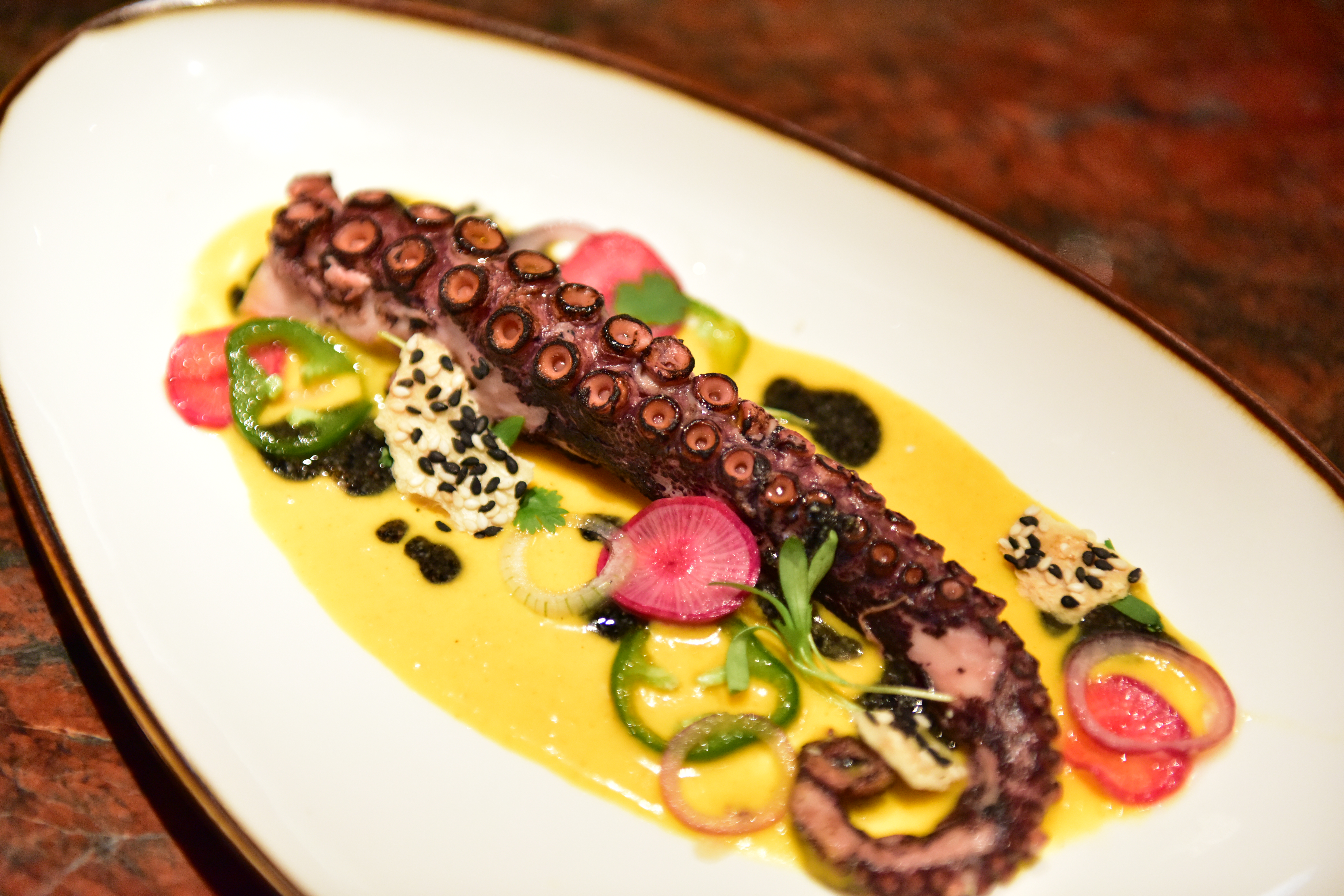 Charred octopus from elements dinner menu.