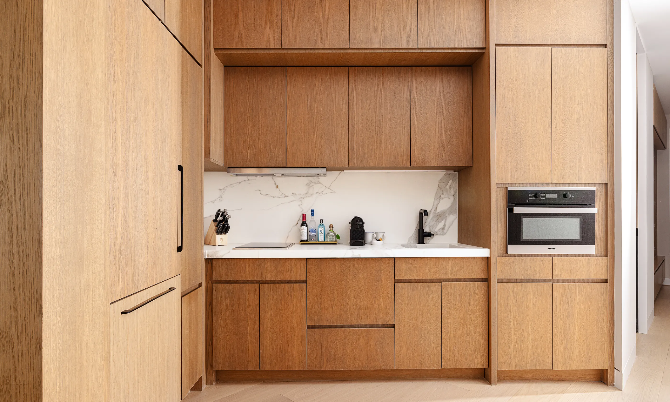 The kitchen in the Ocean View One Bedroom Residence at Gurney's Montauk Resort