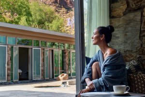 Woman relaxing in spa robes before salon treatment.