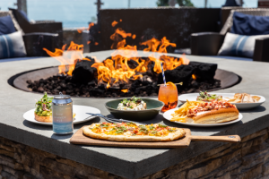 Food set against the firepit at Gurney's Montauk