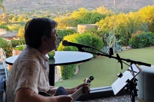 A musician sets up for live music at Jade Bar in Scottsdale