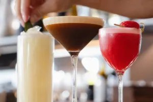 Various cocktails being garnished