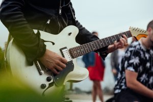 Guy playing guitar