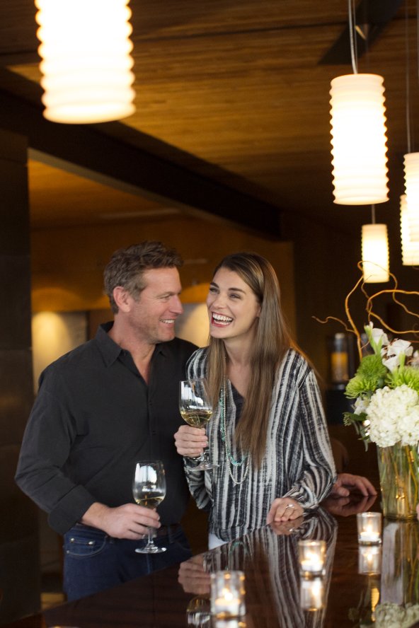 Couples sipping on wine in restaurant