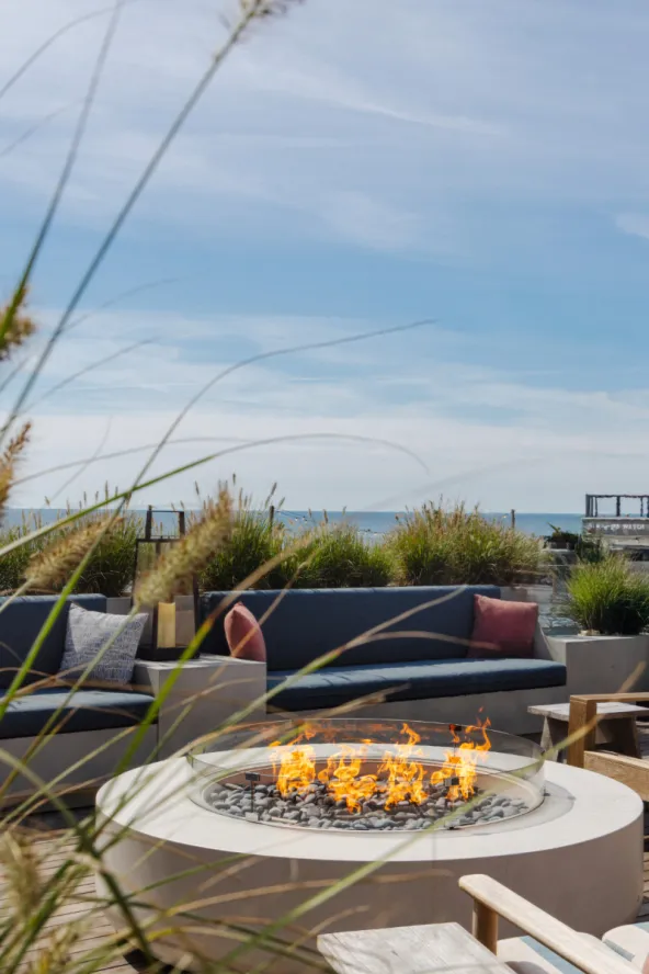 Firepit on fire in the Montauk gurneys 