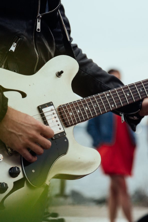 Guy playing guitar