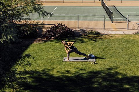 Woman doing yoga outdoors