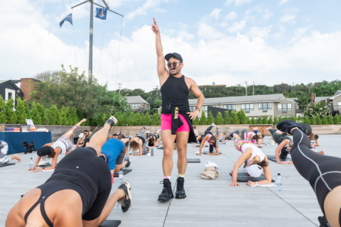 Instructor Isaac Boots leads a fitness class at Gurney's Montauk