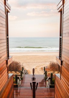 A stairwell frames a view of the ocean at Gurney's Montauk Resort