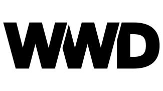 Women's Wear Daily logo black against white background.