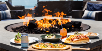 Food set against the firepit at Gurney's Montauk