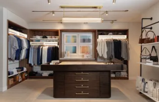 Retail Store full view. Center island with clothing around. 