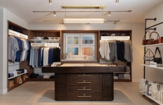 Retail Store full view. Center island with clothing around. 